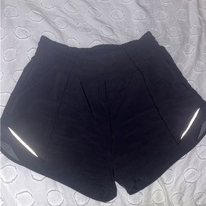 lululemon 4” black high rise Hotty Hot shorts size 4
